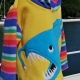 alt="colourful angler fish hoodie"