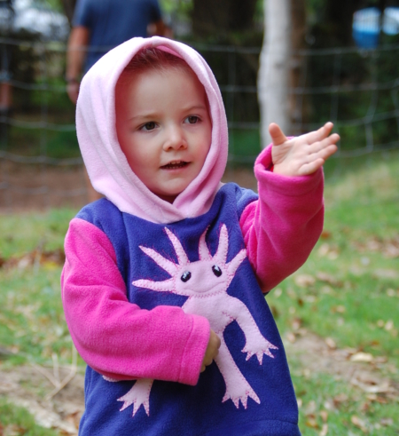 model wearing axolotl hoodie