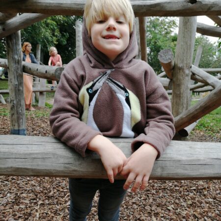 model wearing mocha gannet hoodie