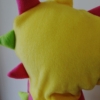 hood spikes close up in yellow, pink and green