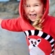 cheeky girl wearing ring tail lemur hoodie