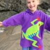 girl wearing red eyed tree frog hoodie