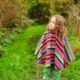 girl wearing zigzag poncho